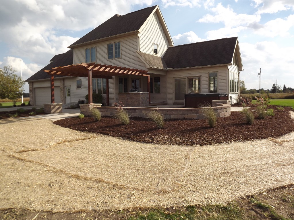 Pergola With Landscaping and Retaining Wall