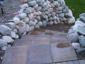 Paved stairs and stone retaining wall