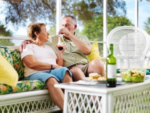 senior couple outside on patio relaxing