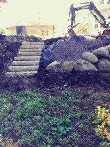 Creating a Retaining Wall With Large Boulders Twin Oaks Landscape