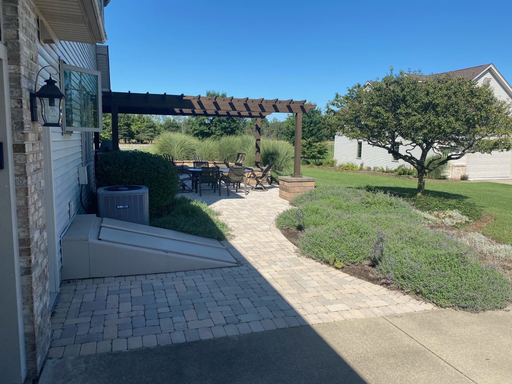 Paver patio off the back of a house in ann arbor michigan