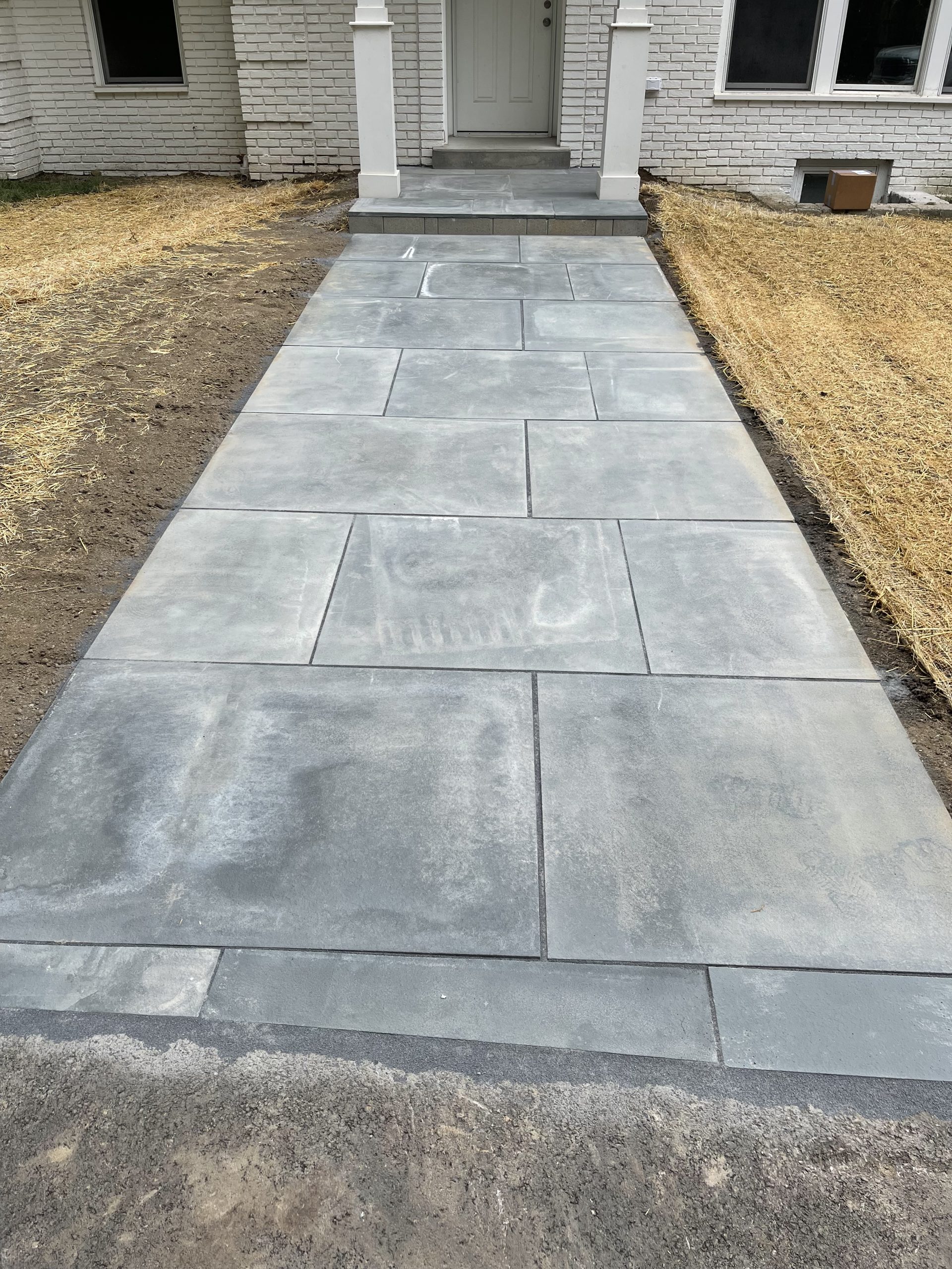 Blue stone front entry walkway.